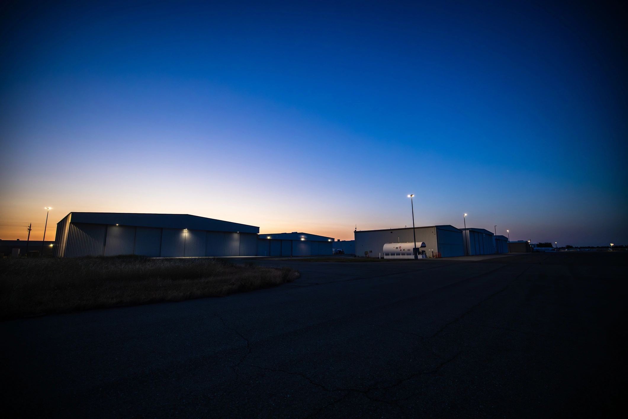 Aircraft hangar at dusk